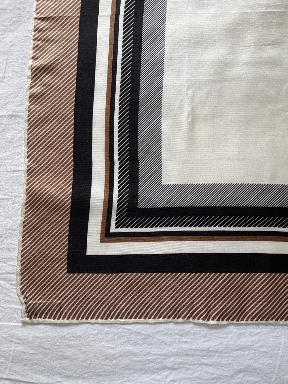 Echo Vintage Echo signed rolled-edge silk scarf featuring a brown, black, and wh - Picture 2 of 10
